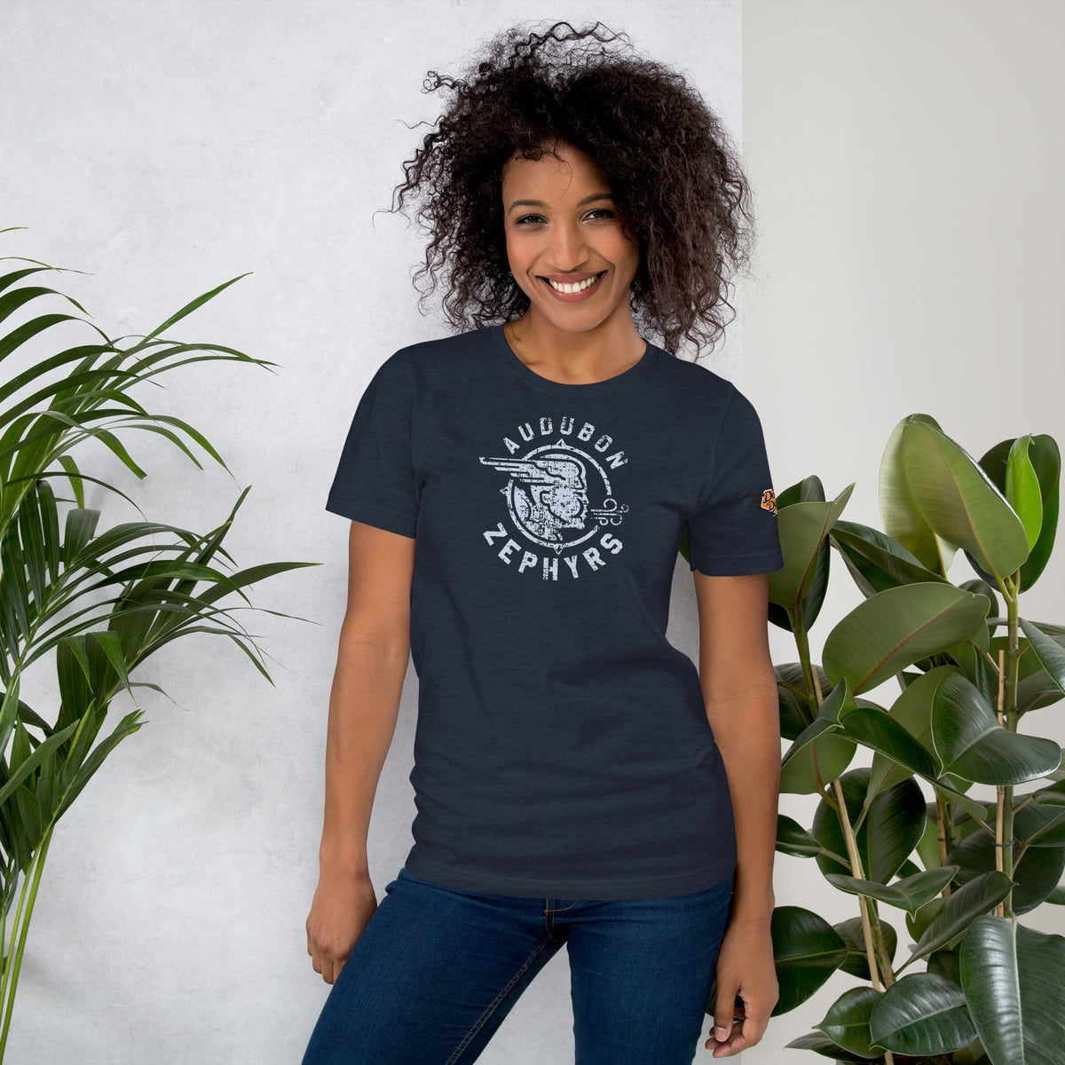 Model wearing Audubon Zephyrs vintage mascot tee in navy